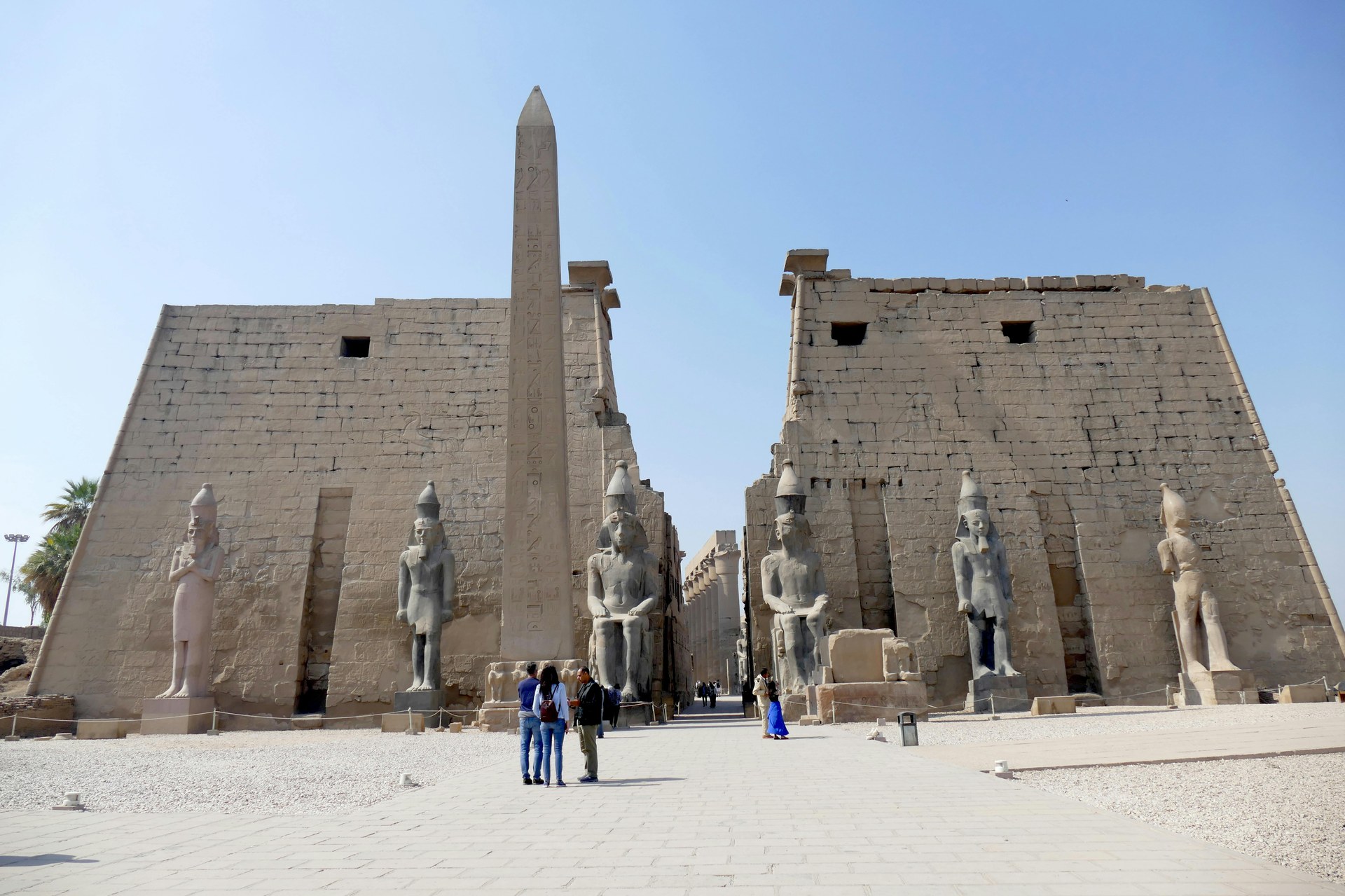 The colonnade and pylon of Luxor Temple lit at dusk on the east bank of the Nile
